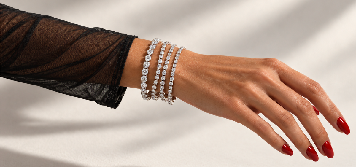 Close-up of a hand wearing Carated diamond jewellery